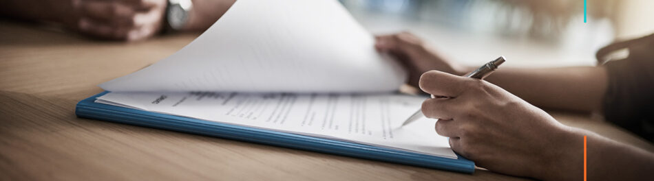 Hand opening and signing Surety Bond
