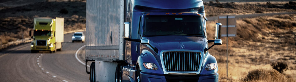 Commercial transport trucks on the highway