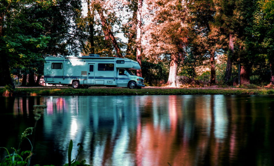 Family trip in motorhome in forest or park in Canada