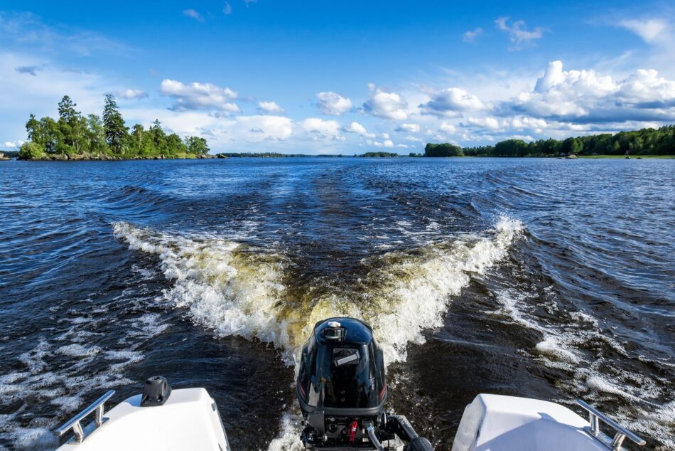 View of lake from behind a boat