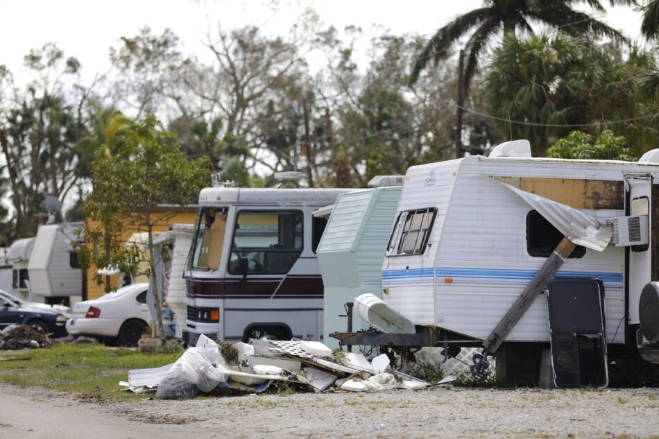 RVs parked in their spots surrounded by melted snow piles