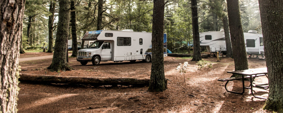 Lake of two rivers Campground Algonquin National Park Beautiful natural forest landscape Canada Parked RV camper car