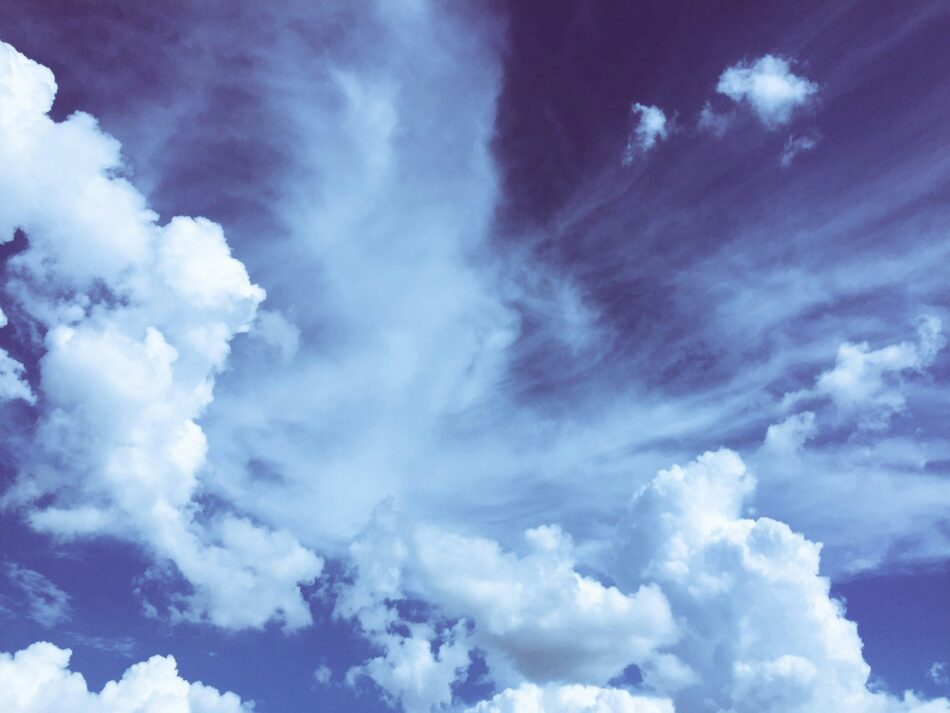 View of blue sky with scattered clouds