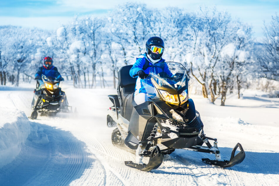 Two snowmobilers in Alberta.