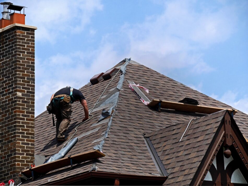 Construction worker working on roofing