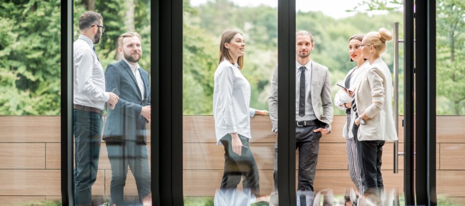 Group of business professional on a patio talking