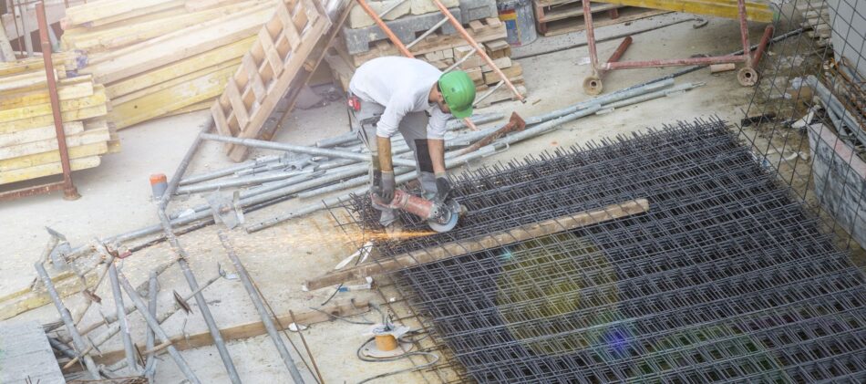 Laying rebar at a construction site