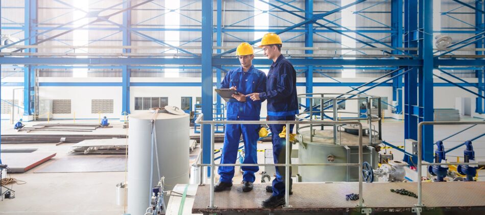 Manufacturing workers in warehouse