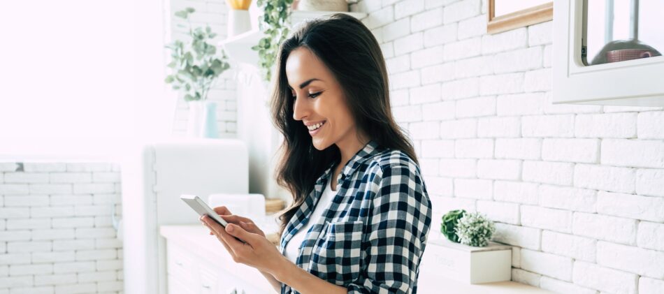 Young woman looking at cellphone