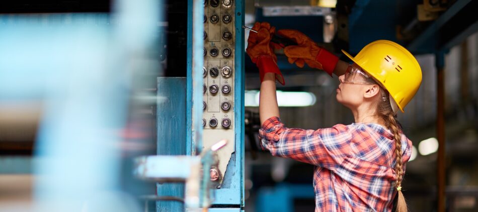 Woman working at skilled trade