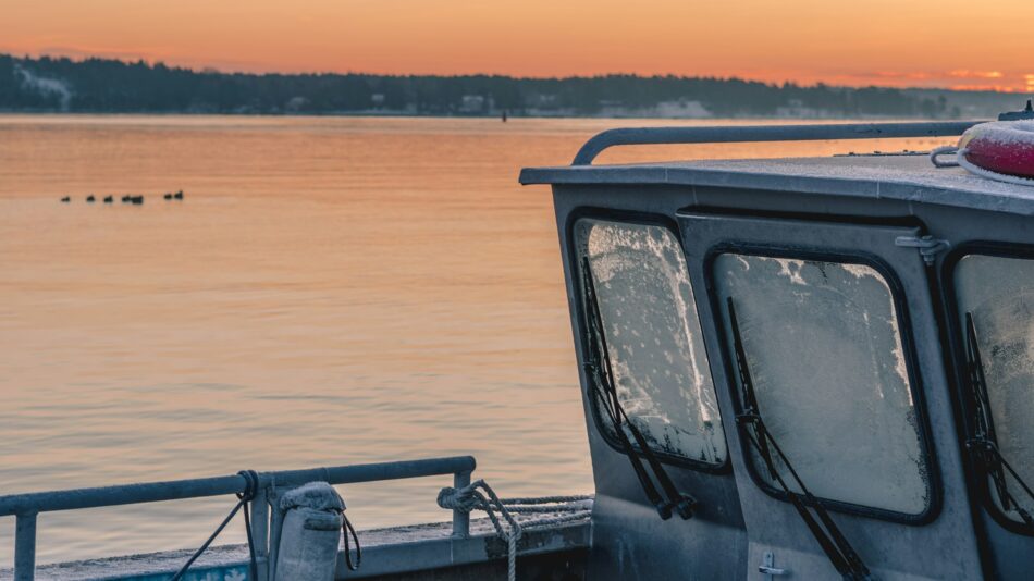 Boat on lake at dusk
