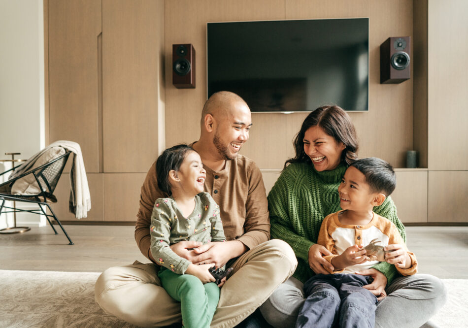 Smiling family of four