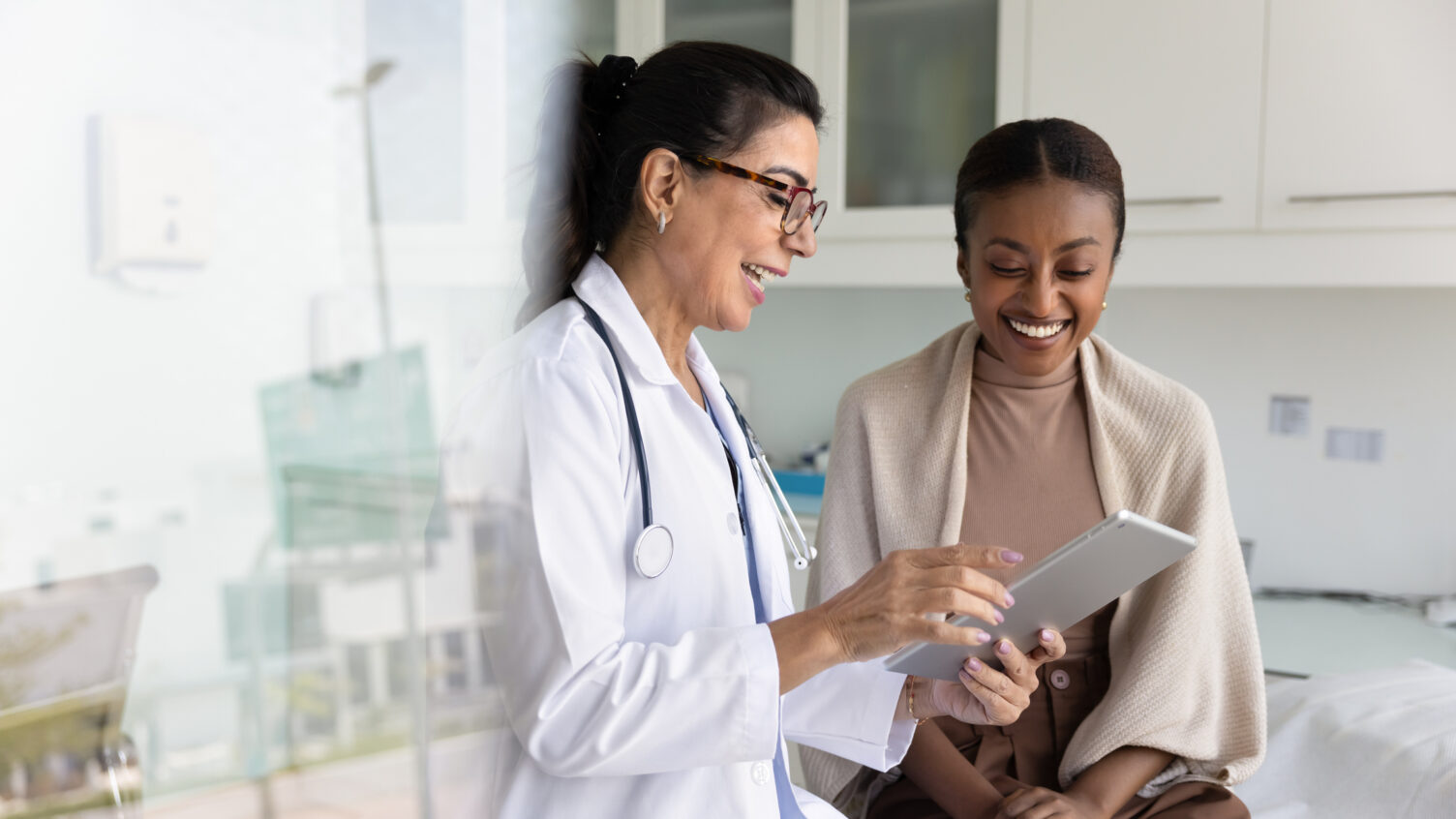 An image of a doctor and patient to represent healthcare