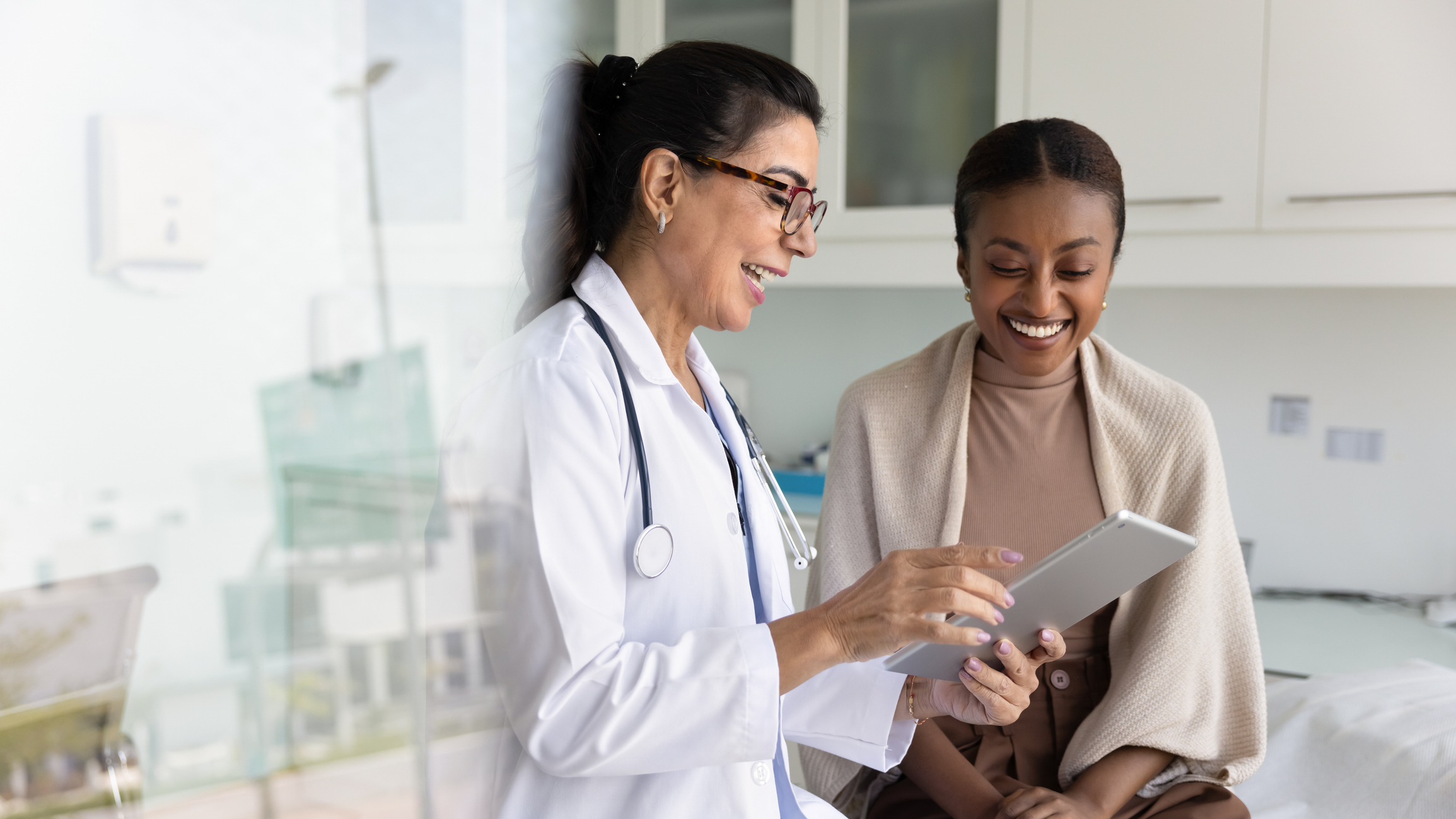 An image of a doctor and patient to represent healthcare