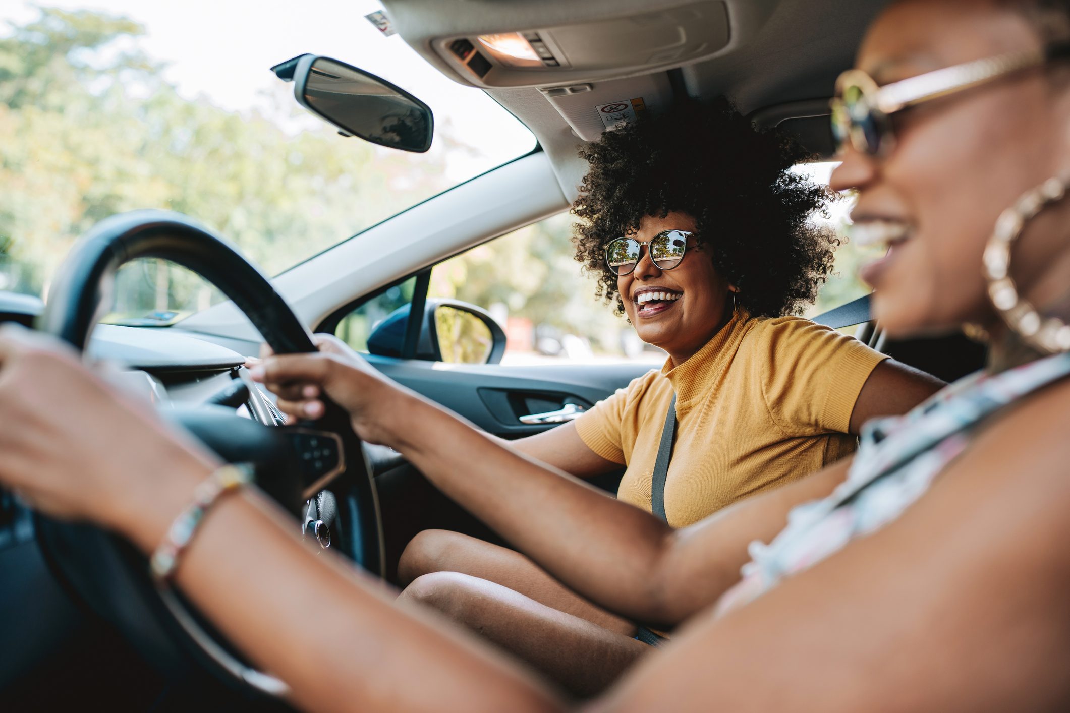 A driver and a passenger in a vehicle